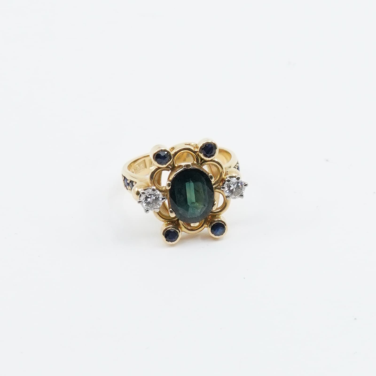 Ring Guld 18K 7,9g Ø17½ med blå/svarta stenar och diamanter 2xca 0,2ct