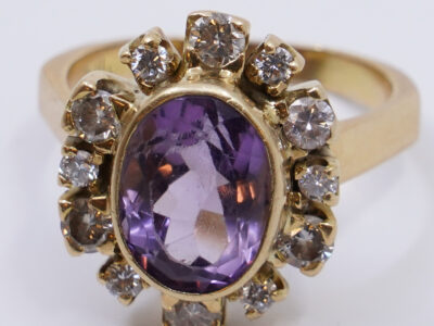 Ring 18K guld med lila sten och diamanter 12xca0,02-0,05ct Ø17,5 6,9g