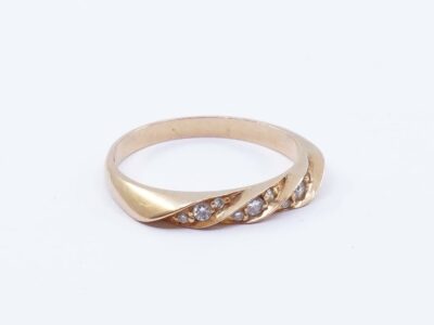 Ring 18K 3,4g Ø19 med diamanter 6xca0,01ct 3xca0,03ct