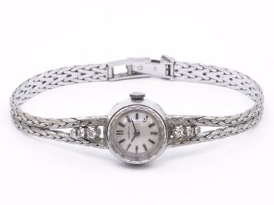 Certina  med integrerat 18K vitguld med diamant ref 0871-329