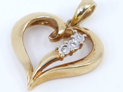 Hänge Guld 18K med diamanter 3xca0,01ct