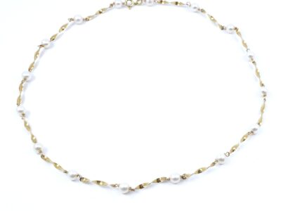 Collier med odlade sötvattenspärlor 18K 10,9g Längd 49cm Bredd 3-5mm, springlås