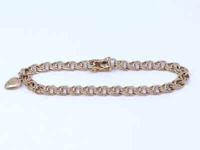 Armband Bismarck Guld med en integrerad berlock hjärta
