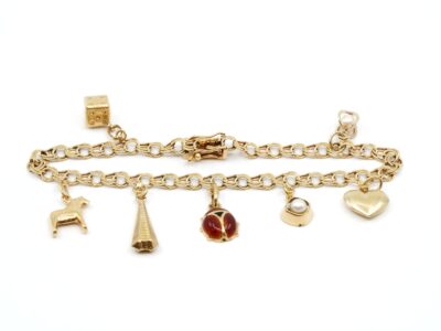 Armband Bismarck Guld 18K Med 7st berlocker