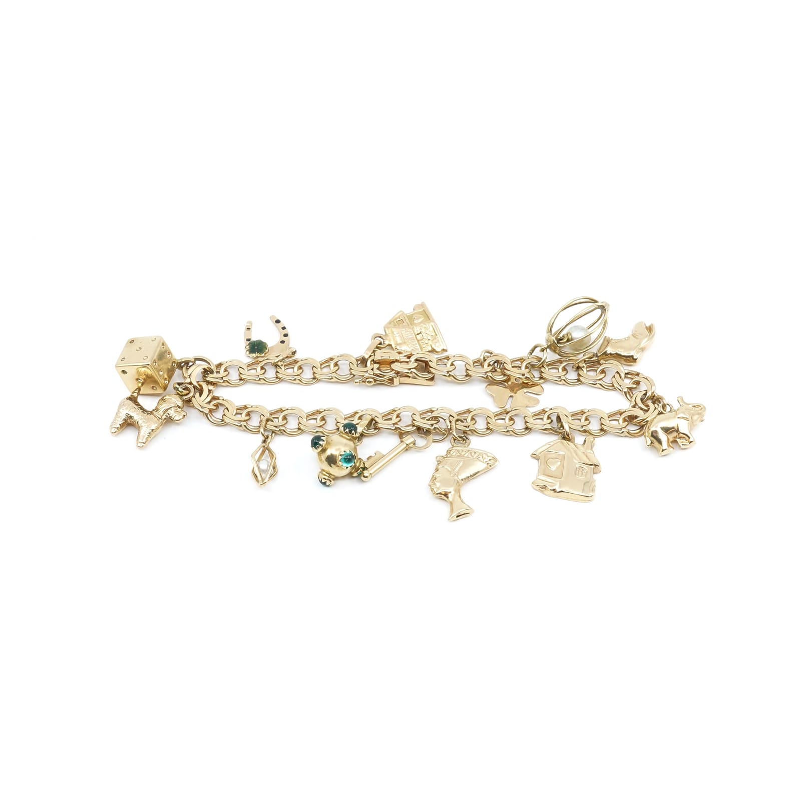 Armband Bismarck med 13 Berlocker Guld 18K L 19cm B 7mm