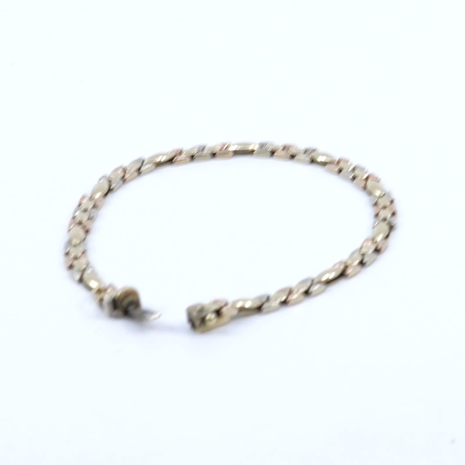 Armband trefärgat guld