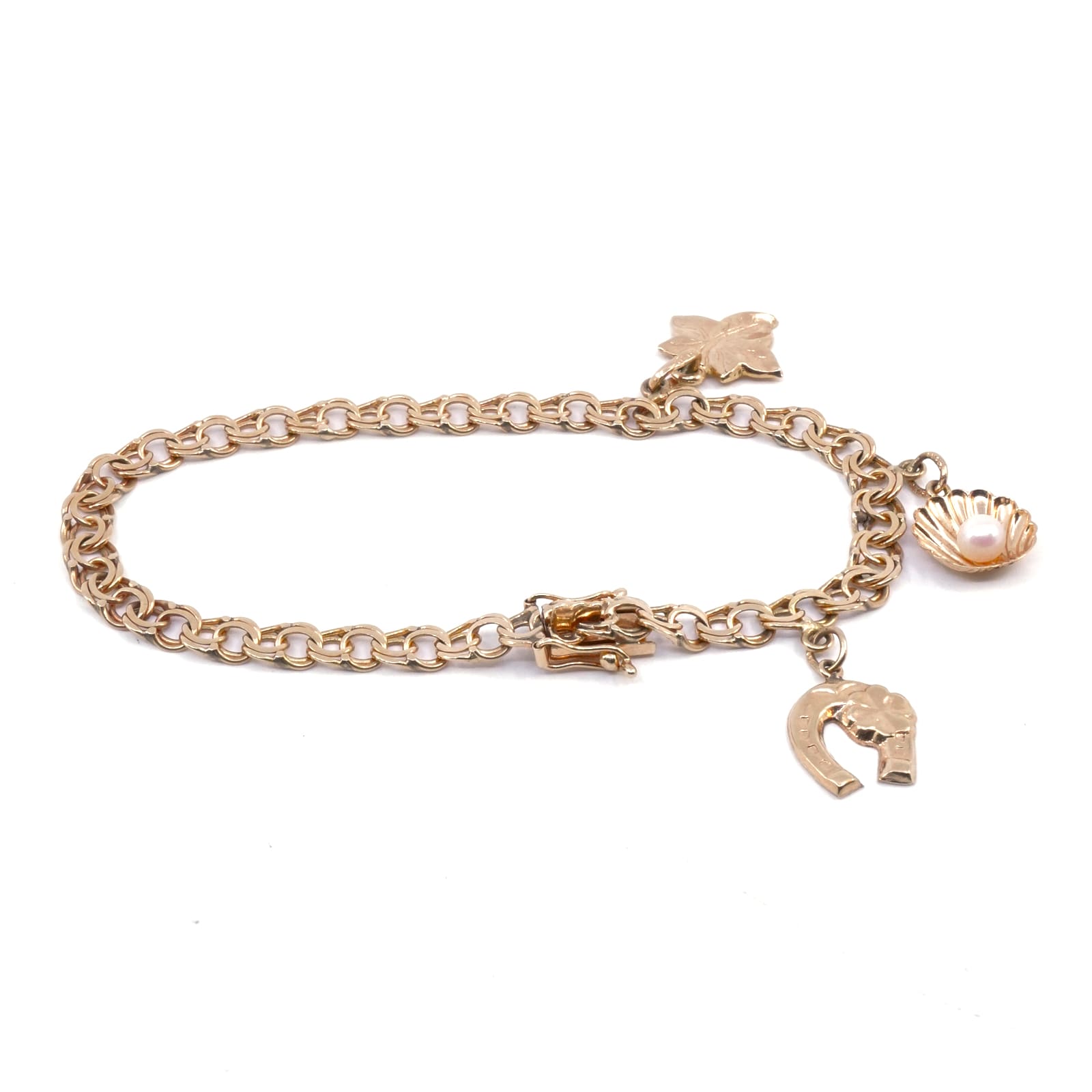 Armband Bismarck Guld 9,7g Längd 18,5cm Med berlocker