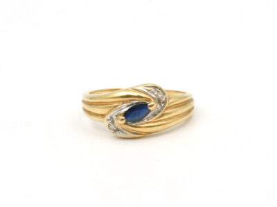 Ring 18K 2,11g med blå sten och diamanter