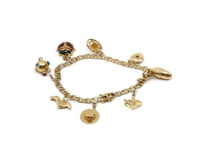 Armband Bismarck Guld 18K med berlocker