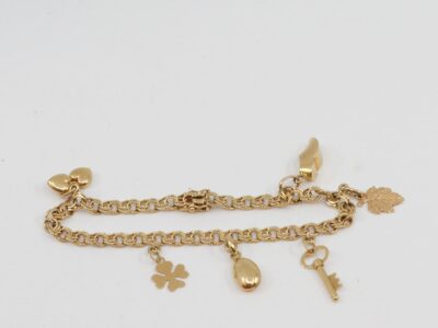 Armband Bismarck 18K med berlocker