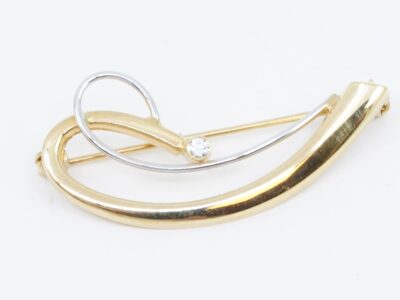 Brosch 18K med sten
