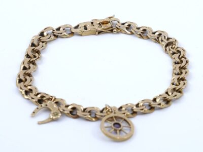 Armband Bismarck med 2 berlocker Guld 18K