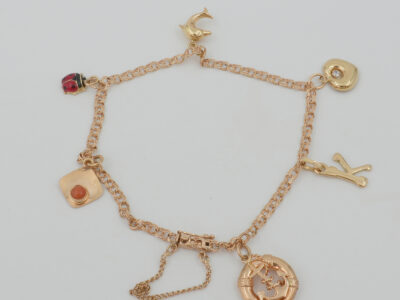Armband Bismarck med berlocker Guld 18K 6,2g Längd 19cm Kistlås