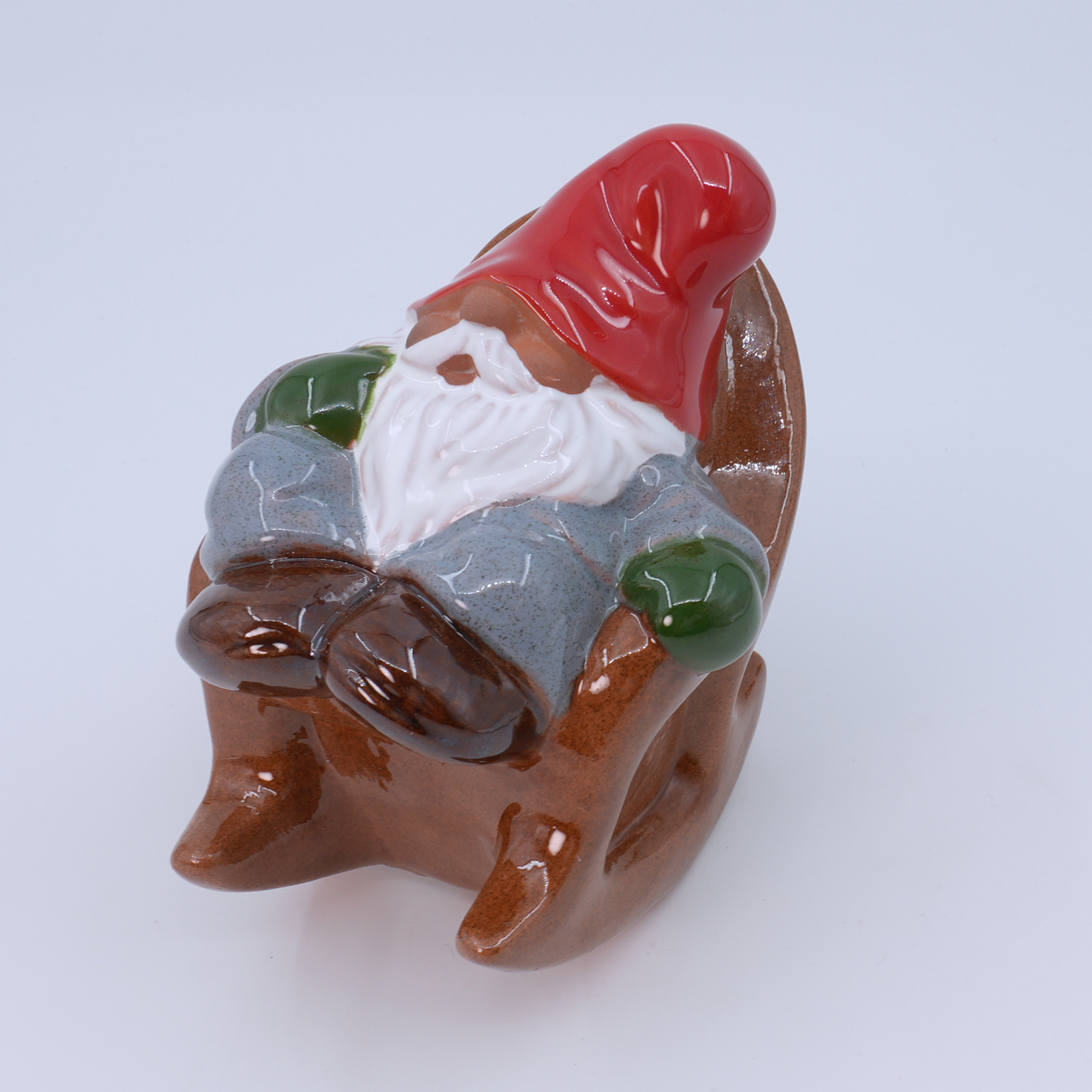 Figurin tomte i gungstol Höjd ca 11,5cm, Rolf Berg Keramik