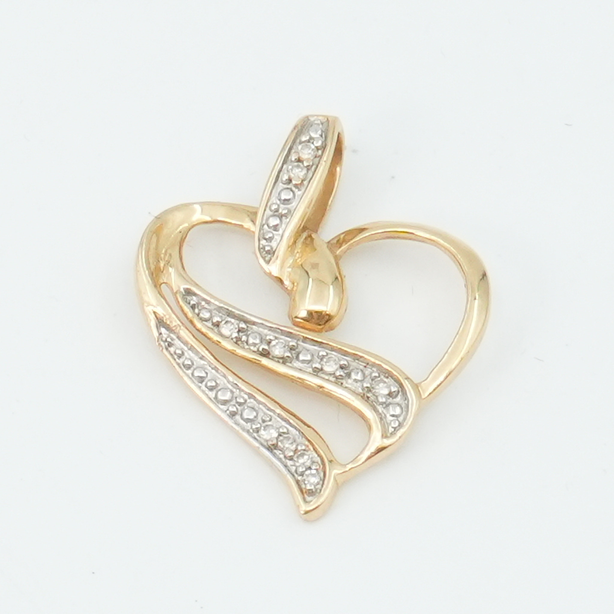 Hänge 18K 1,1g Höjd 18mm med diamanter 10xca0,005ct