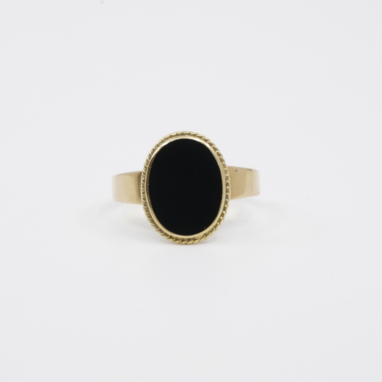 Ring med svart sten18K brv 3,6g Ø18¼