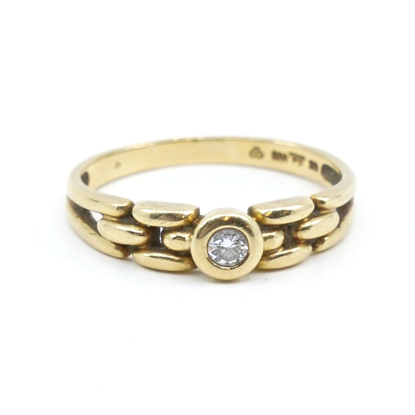Ring med diamant 1xca0,08ct Guld 18K 3,1g Ø17,5