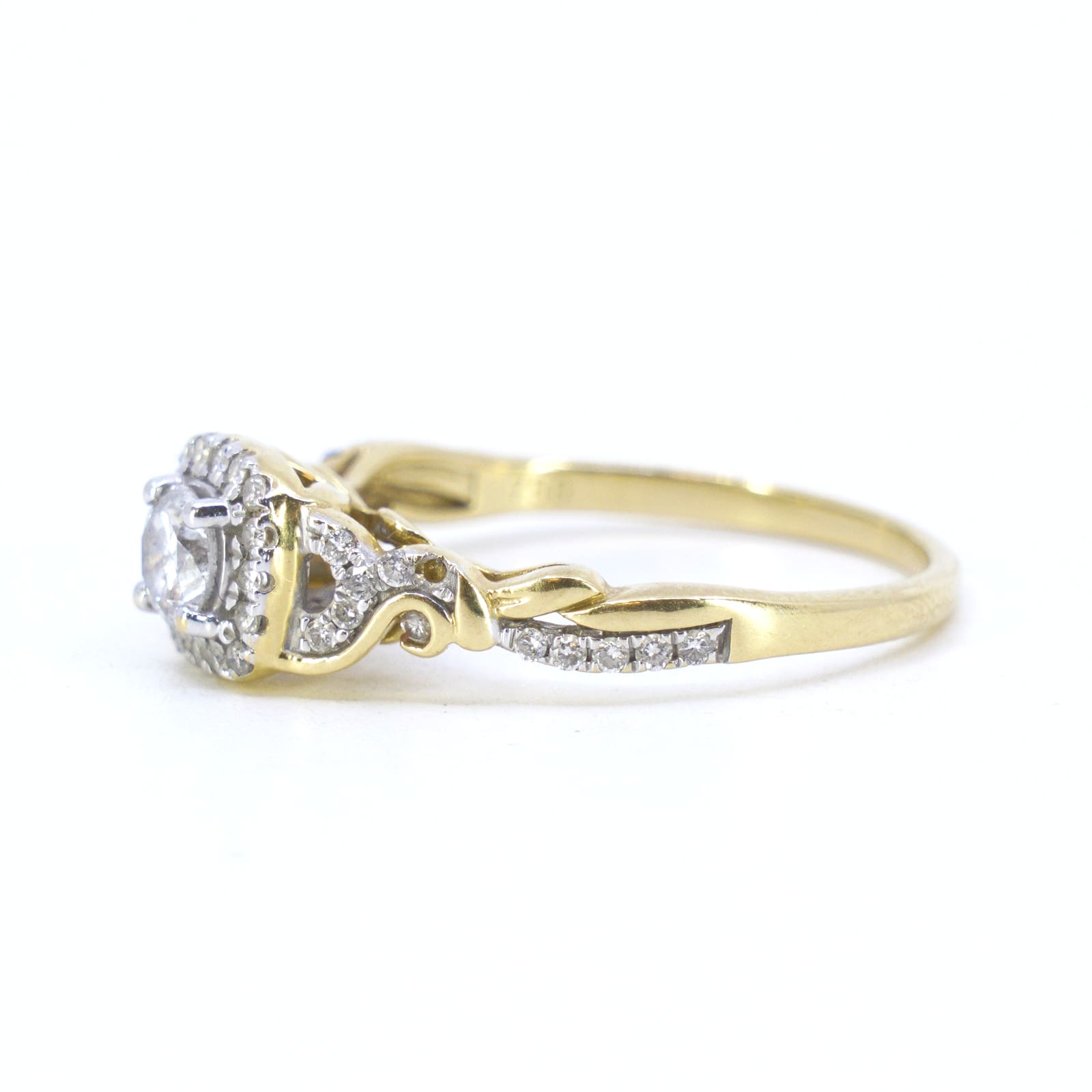 Sidostensring med diamanter 1x ca 0,40ct & 23x ca 0,01ct