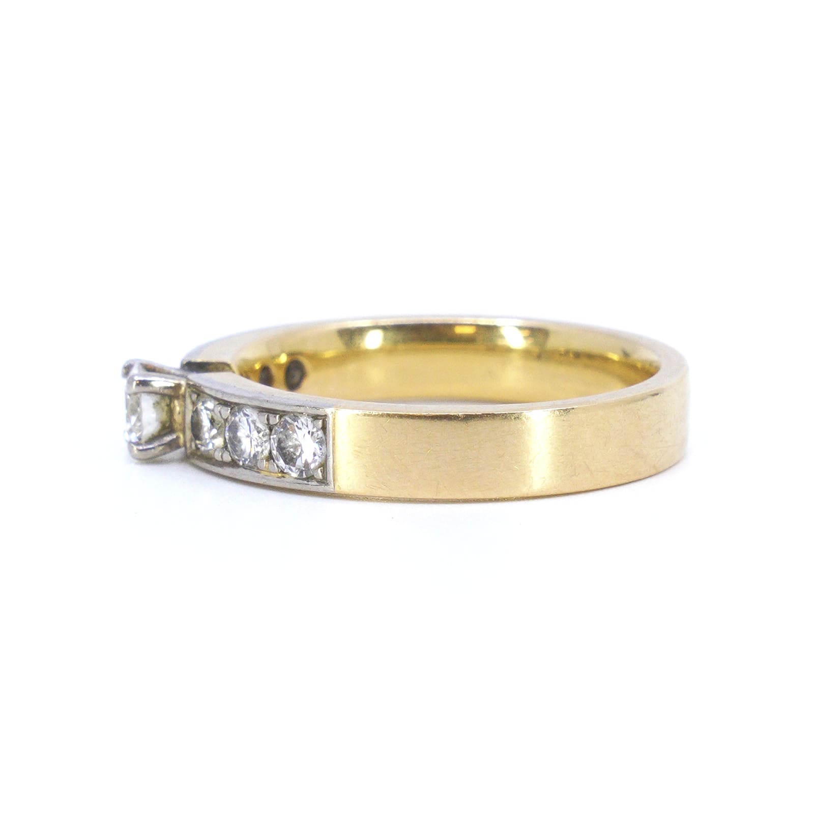 Sidostensring med diamanter
