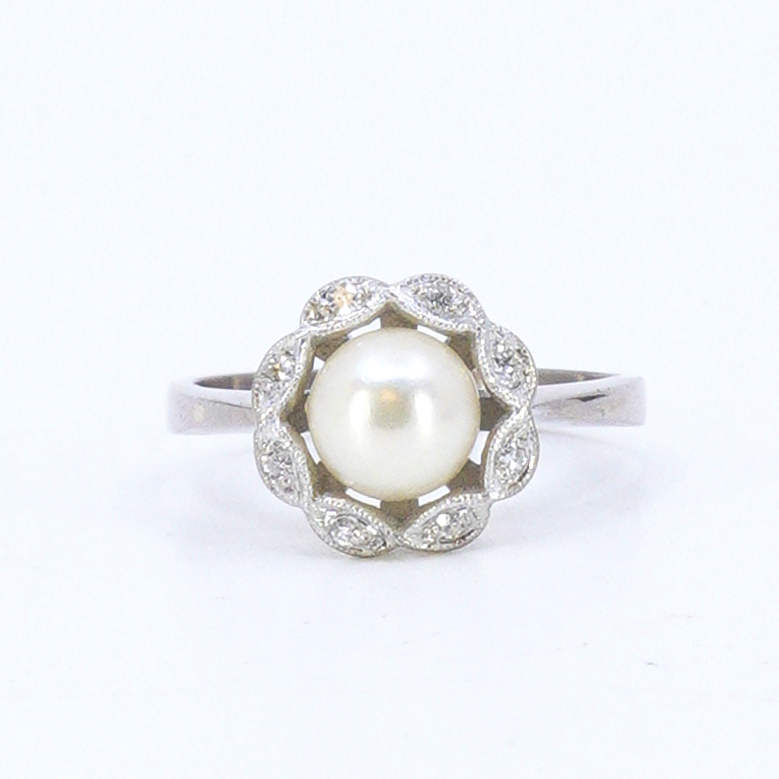 Ring och diamanter 8x totalt 0,07ct