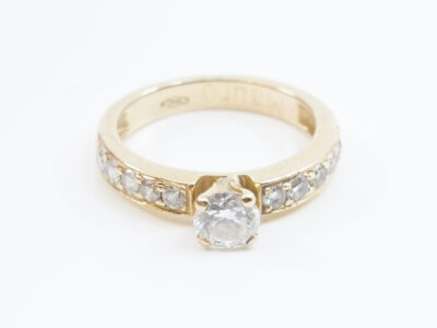 Ring Guld 18K 3,5g Ø15½ med diamant 1xca 0,5ct 10x0,03ct