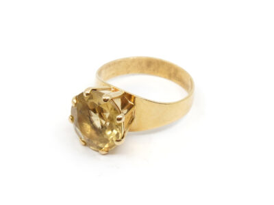 Ring Guld 18K Med gul sten