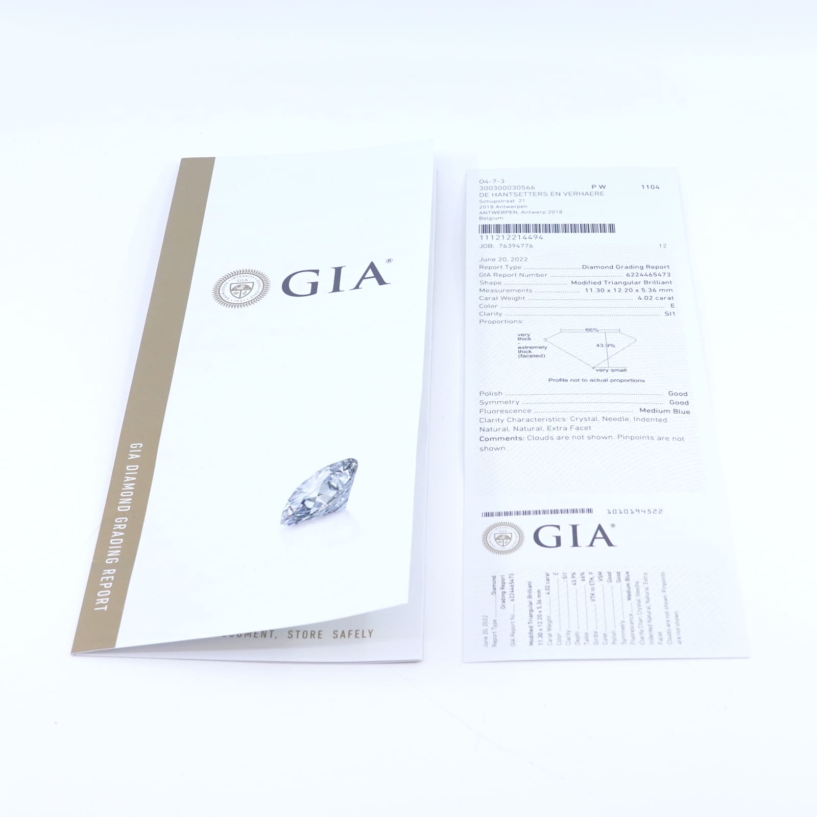Diamantring 18K med diamanter varav en trilliantslipad 1xca4,02ct SI1/E