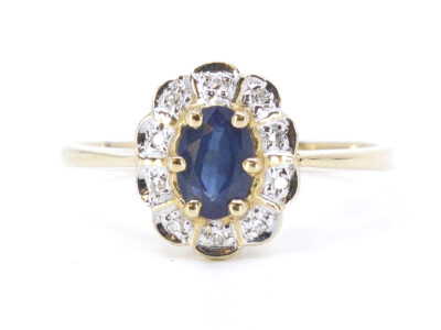 Carmoséring med diamanter & blå safir