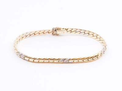 Armband tvåfärgat Guld
