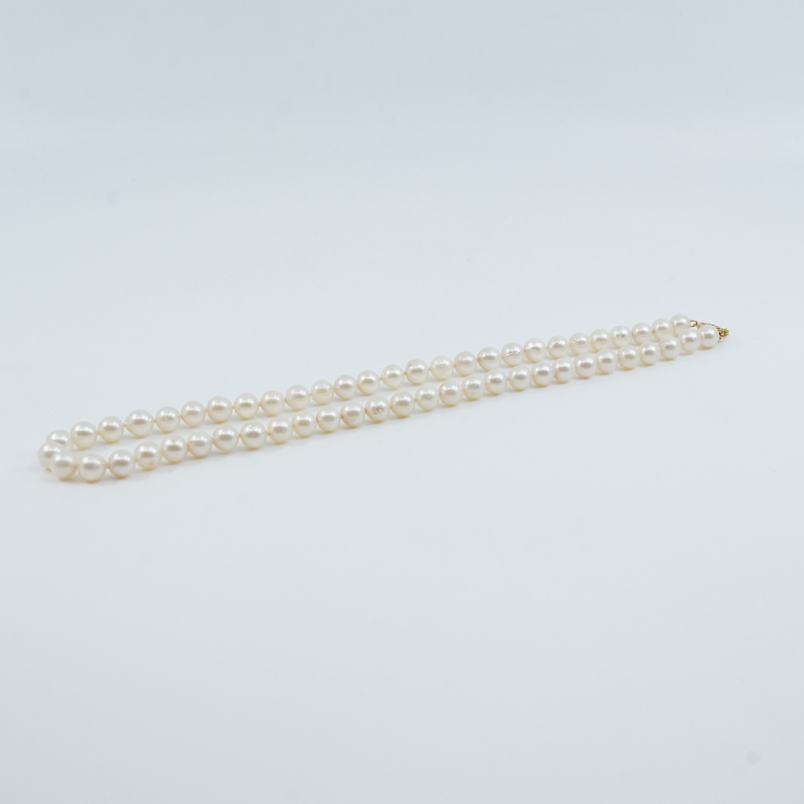 Pärlcollier med lås