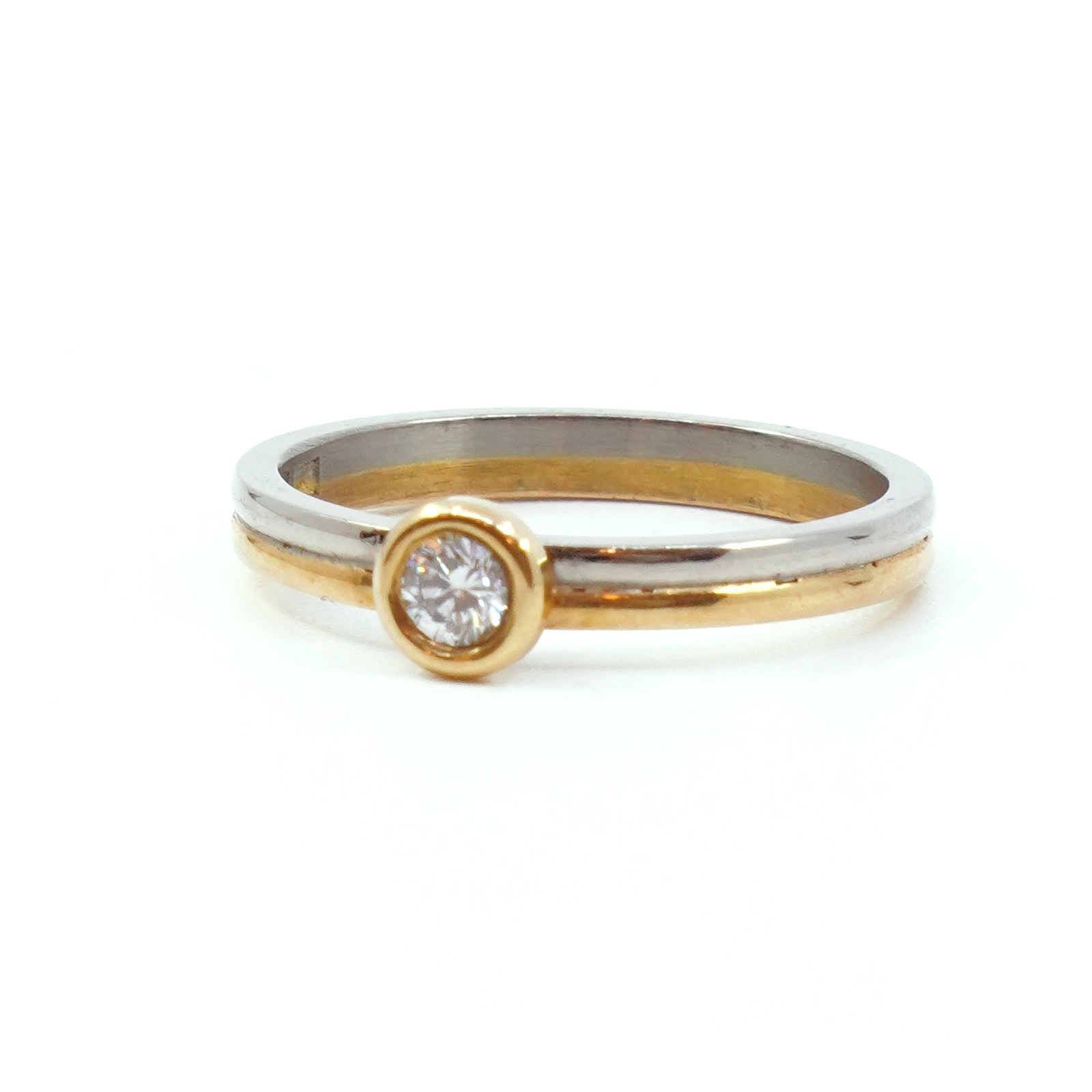 Ring Guld 18K tvåfärgad med diamant 1x0,12ct