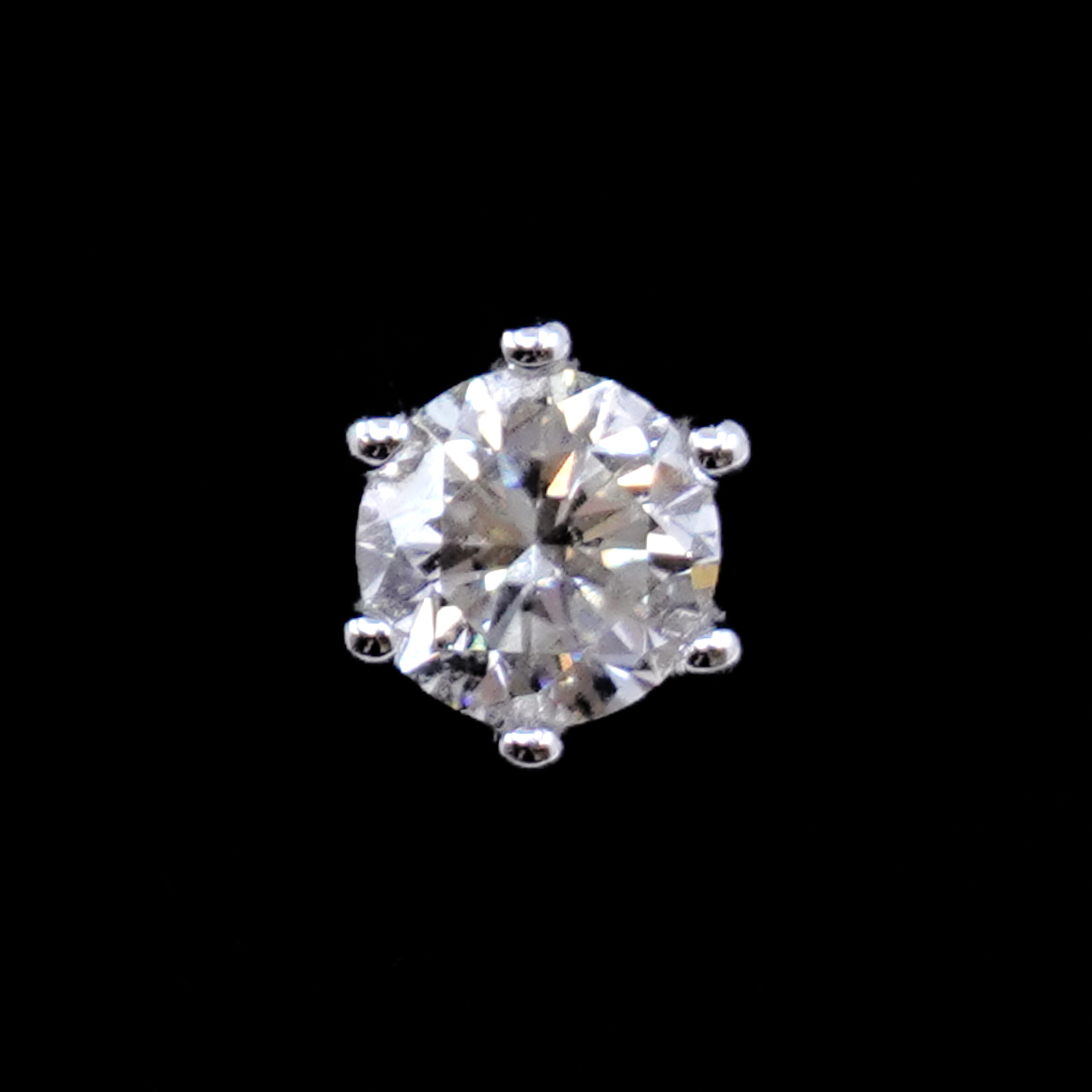 Diamantörhänge ett udda 1xca0,70ct Si G med certifikat Guld 14K