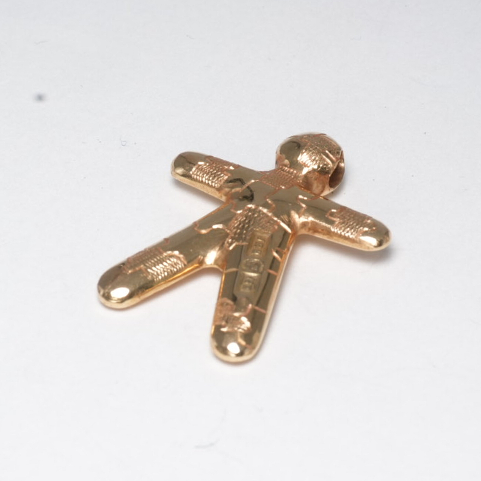 Hänge figur med motiv av pusselbitar 18K - Juvelerare Bertil Grahn