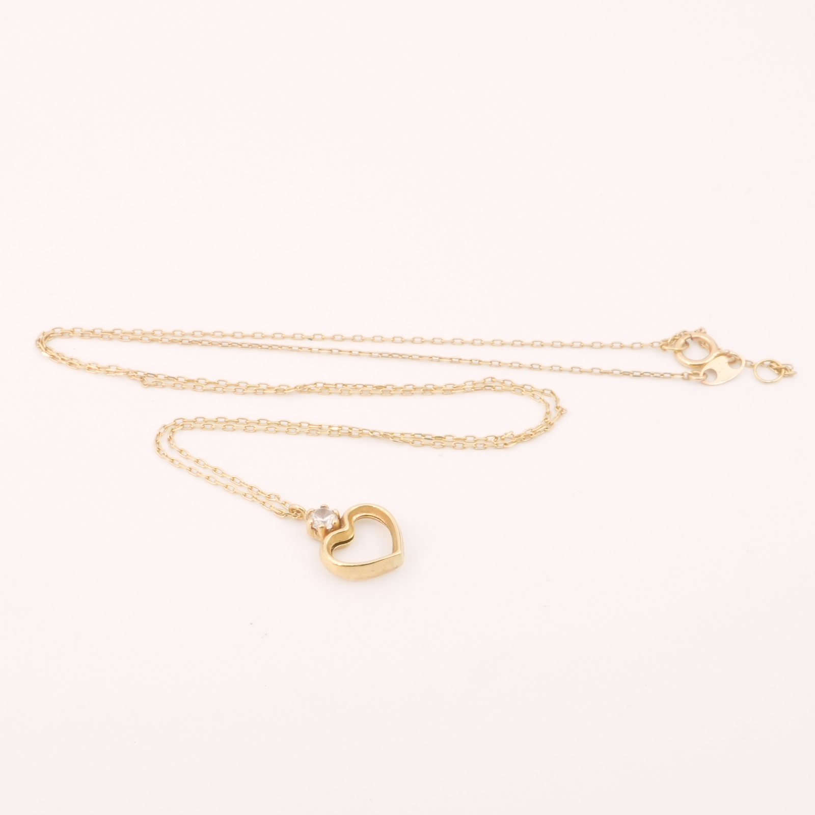 Halskedja Guld 18K 1,4g Längd 45,5cm med integrerat hänge