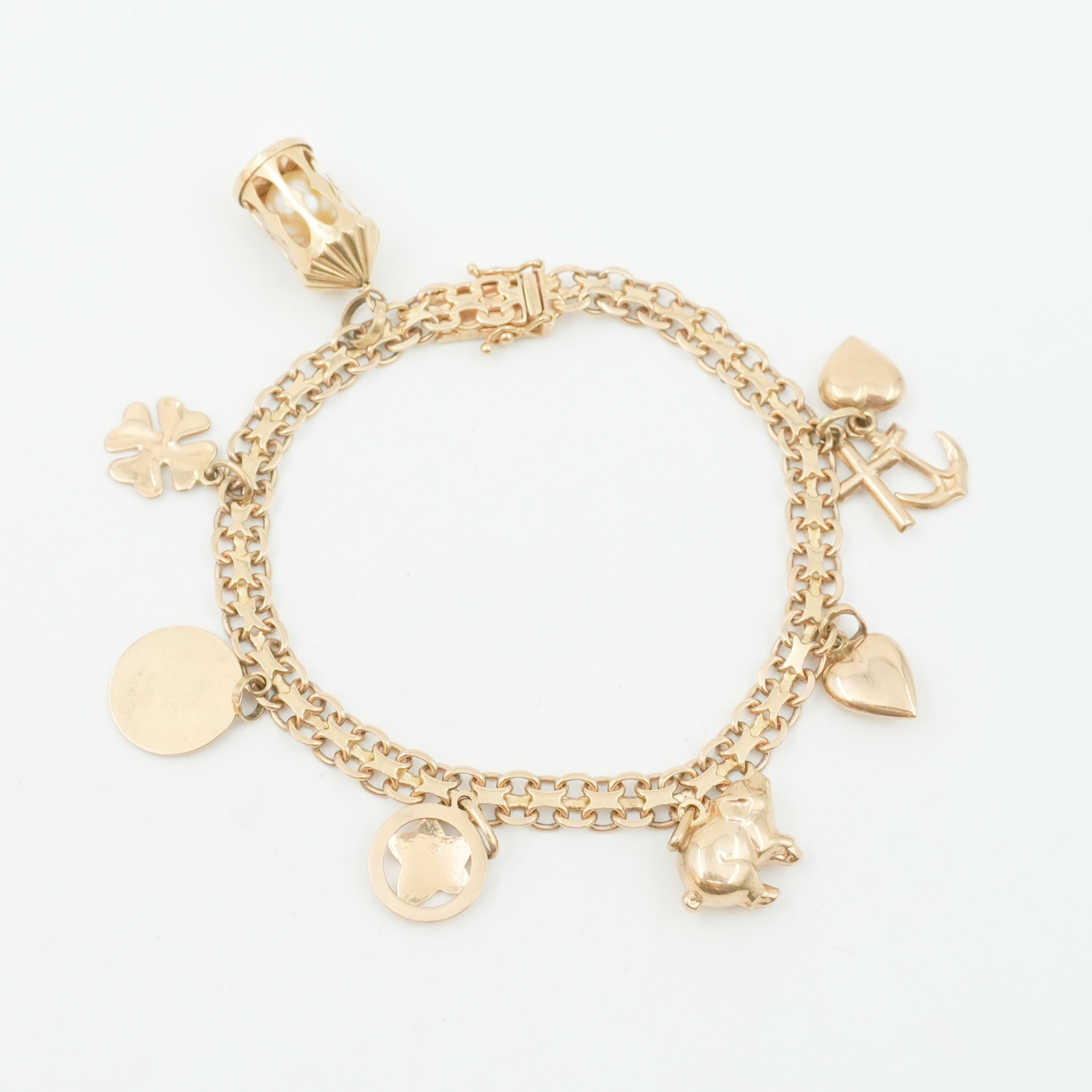 Armband Guld 18K X-länk med berlocker