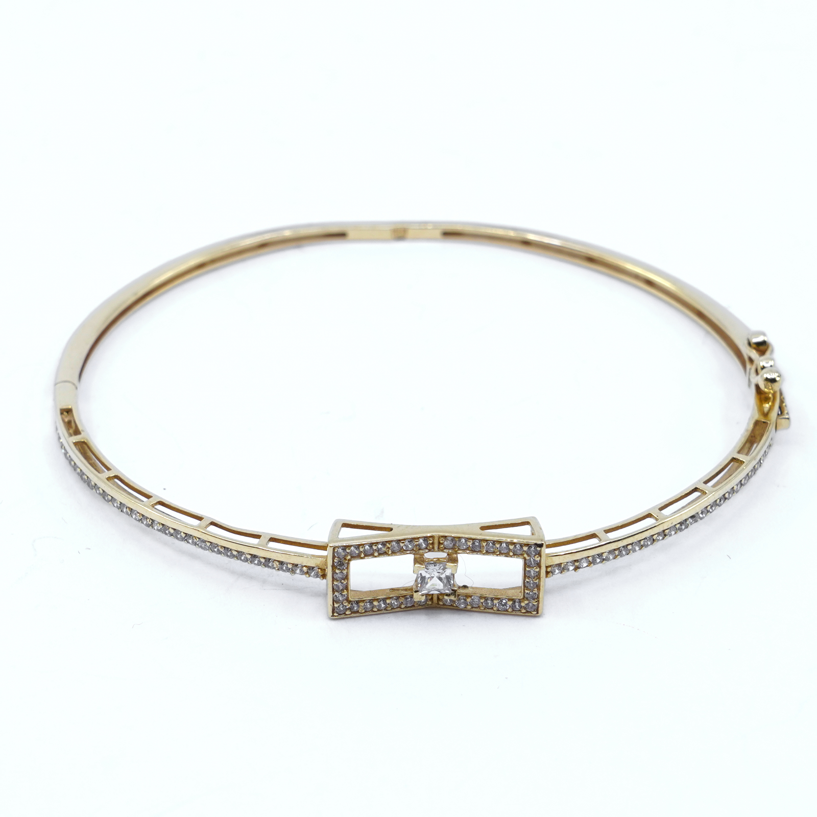 Armring 18K guld med vita stenar